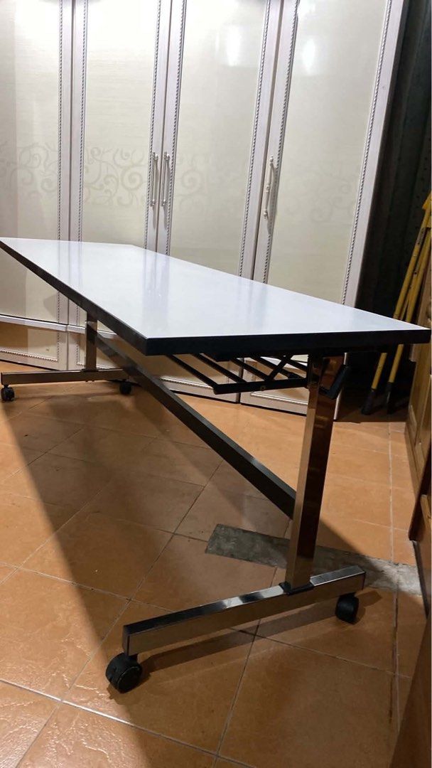 WORKING TABLE ‼️ (Category: Announcements) located in Manila. Submitted by nanzkie_2015 (Listing ID 1463981748, Image 1). Description: WORKING TABLE ‼️ L71 W23.5 H27.5 inches 🏷️5,000 *folding *stainless legs *w/ wheels.