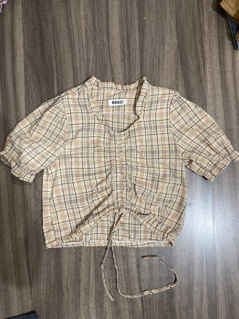 Y2K BBGD Plaid Ruched Halter Top (Category: Blouses) located in Santa Rosa. Submitted by chickenjoint_222 (Listing ID 1463979393, Image 1). Description: - Cute plaid halter top from BBGD - Features a ruched front with tie details - Nice checkered pattern fabric - Best fits size Small or Medium - Ideal for casual day outs or nights with friends.