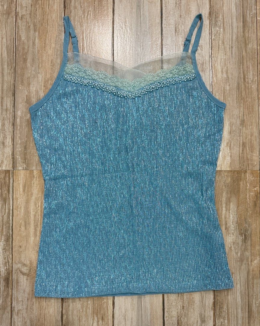 y2k blue sleeveless top (Category: Sleeveless) located in Tuguegarao City. Submitted by rerack.ph (Listing ID 1464094053, Image 3). Description: -Whimsical/Y2K blue sleeveless top -w/ adjustable strap -estimated size S/M -beaded top - slightly stretchable NO COD PRICE + SF .