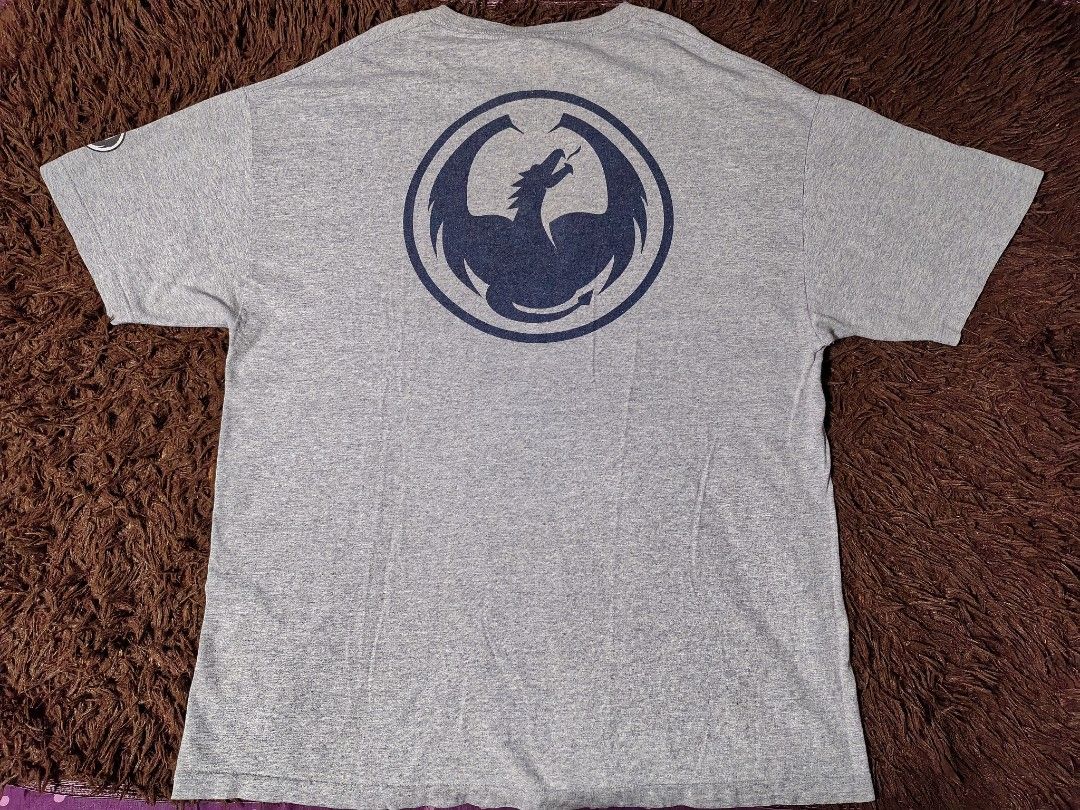 Y2K Dragon Skateboarding Tshirt (Category: Tshirts & Polo Shirts ) located in San Juan City. Submitted by reddvelasquez4298 (Listing ID 1463952324, Image 2). Description: Y2K Dragon Skateboarding LogoTshirt 23 Width 30. 5 Length Good Condition Issue Loose Stitching, butas sa kilikili. Check photos. 2000 pesos PM.