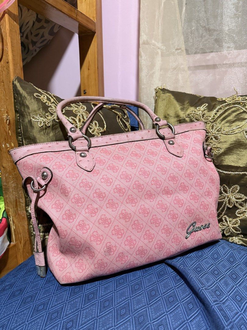 Y2K Pink Guess Monogram Tote Bag (Category: Shoulder Bags) located in Quezon City. Submitted by mel.highmoons (Listing ID 1464044696, Image 1). Description: superrrrr ganda and spacious! i luv the hint of ostrich leather. needs cleaning langgg. pwede pa for school or office. MOP: BPI/Bank Transfer MOD: Lalamove, Flash Express Shipping fee to be shouldered by buyer..