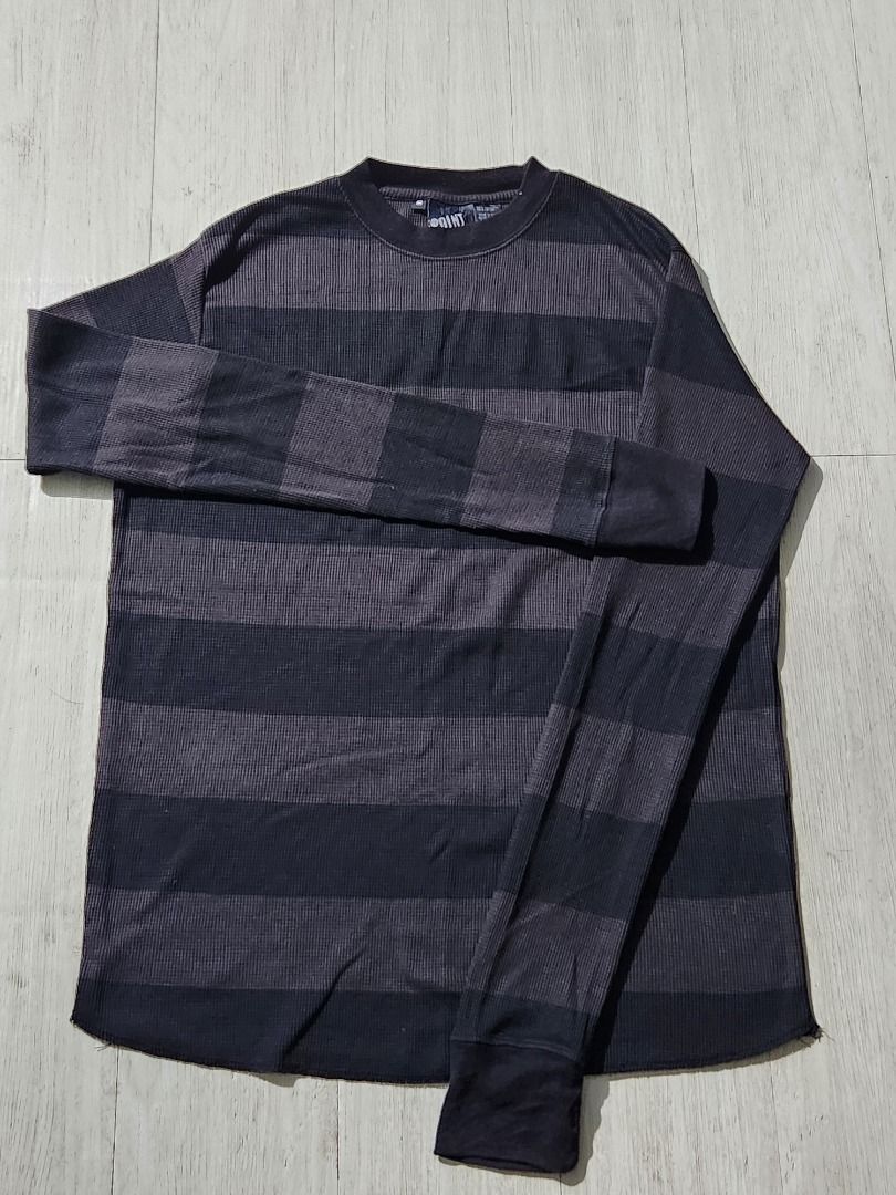 Y2k Striped Long Sleeve Shirt (Category: Tshirts & Polo Shirts ) located in Caloocan City. Submitted by asianslovesn123 (Listing ID 1464058111, Image 1). Description: - Dark grey and black striped long-sleeved shirt - Textured waffle knit fabric - Classic crew neck - Comfortable for everyday wear - Ideal for layering or wearing solo.