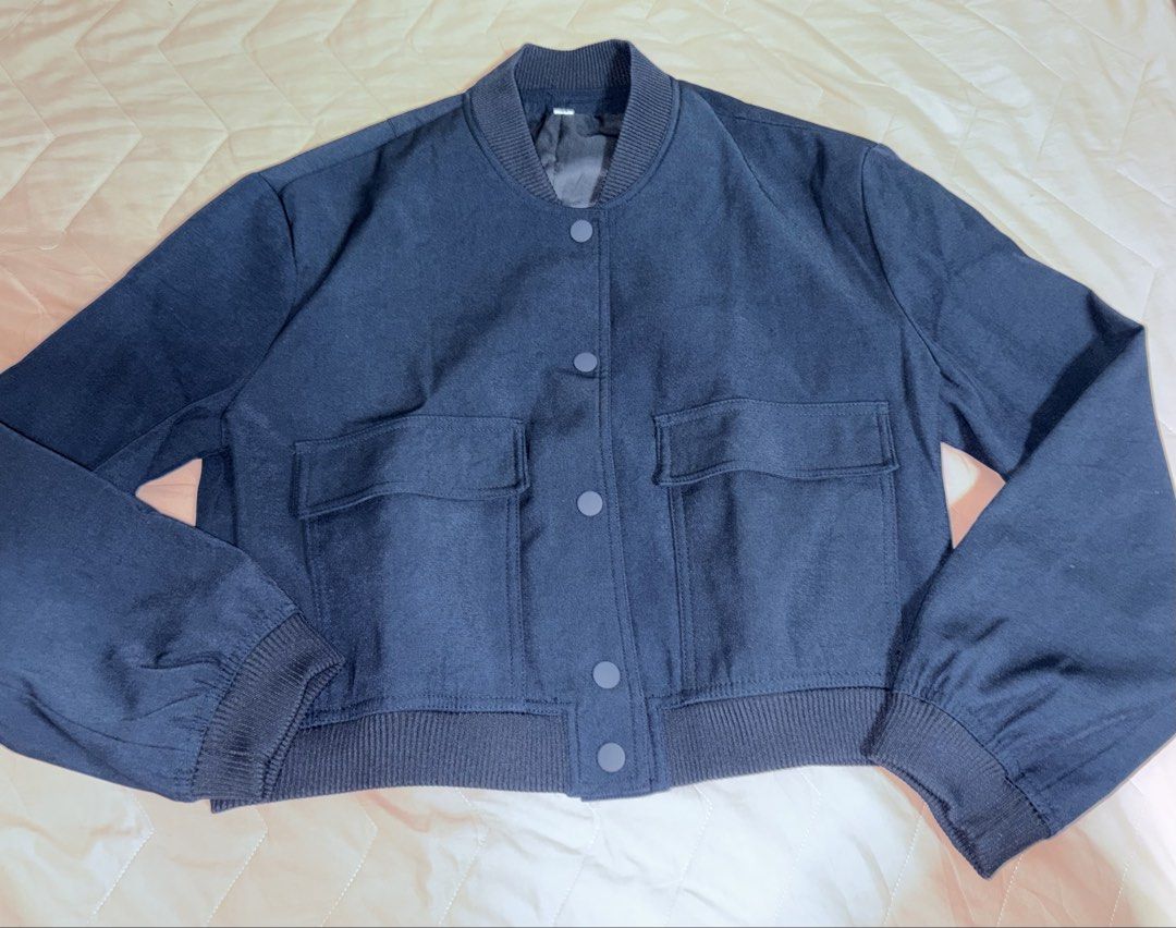 YATO Cropped Bomber Jacket Navy Blue Size M (Category: Coats, Jackets and Outerwear) located in Makati City. Submitted by justtinabelles (Listing ID 1464043775, Image 1). Description: - Navy blue cropped bomber jacket - Size M - Stand collar with ribbed trim - Two front flap pockets with button closure - Button-up front - Ribbed cuffs and hem - Lined interior - used once .