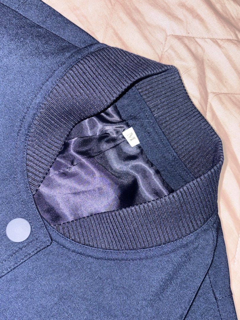 YATO Cropped Bomber Jacket Navy Blue Size M (Category: Coats, Jackets and Outerwear) located in Makati City. Submitted by justtinabelles (Listing ID 1464043775, Image 2). Description: - Navy blue cropped bomber jacket - Size M - Stand collar with ribbed trim - Two front flap pockets with button closure - Button-up front - Ribbed cuffs and hem - Lined interior - used once .