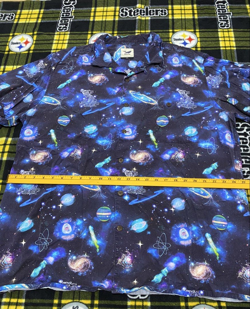 YIUME,Short-sleeve Galaxy print (Category: Tshirts & Polo Shirts ) located in Cavite. Submitted by jc_thrift95 (Listing ID 1464090108, Image 3). Description: - a short-sleeve button-up camp shirt featuring a vibrant blue galaxy print with planets and atomic symbols. .