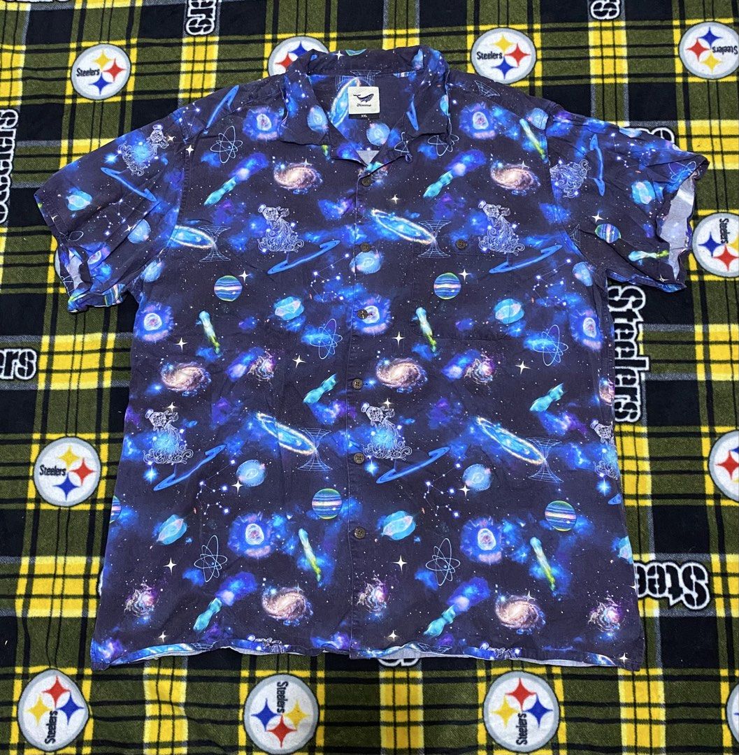 YIUME,Short-sleeve Galaxy print (Category: Tshirts & Polo Shirts ) located in Cavite. Submitted by jc_thrift95 (Listing ID 1464090108, Image 1). Description: - a short-sleeve button-up camp shirt featuring a vibrant blue galaxy print with planets and atomic symbols. .