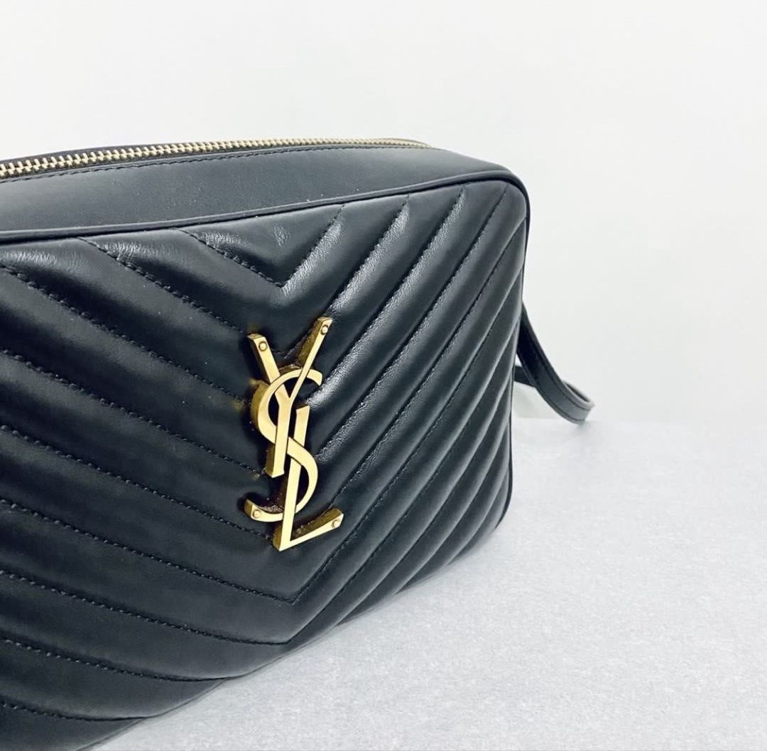 YSL Lou Camera Bag (Category: Luxury Bags & Wallets) located in Makati City. Submitted by aideclutter (Listing ID 1464088255, Image 2). Description: • Current retail price : EUR 1,590 (About ₱114,000) • Bought for EUR 1,250 (₱88,952) • Bought in Paris • Used only a few times • Size : 9in (L) x 6.5in (H) x 2.5in (W) • Material : Calfskin leather • With Detachable Tassel Charm • Adjustable Shoulder Strap • With dustbag and box • With receipt (poste