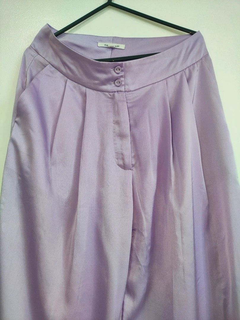 Zalora x The Edit Lilac Silk Pants (Category: Other Bottoms) located in Quezon City. Submitted by maxsab (Listing ID 1464042892, Image 2). Description: - Unique silk trousers in lilac - With side pockets - With button and zipper closure.