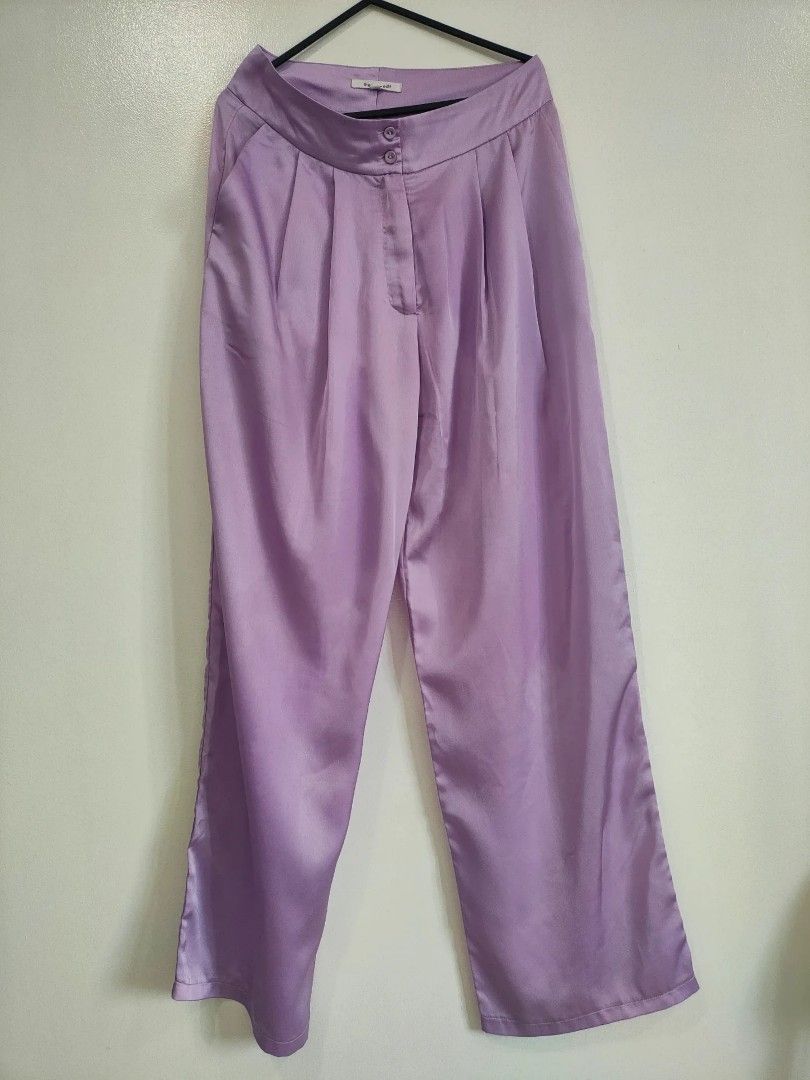 Zalora x The Edit Lilac Silk Pants (Category: Other Bottoms) located in Quezon City. Submitted by maxsab (Listing ID 1464042892, Image 1). Description: - Unique silk trousers in lilac - With side pockets - With button and zipper closure.