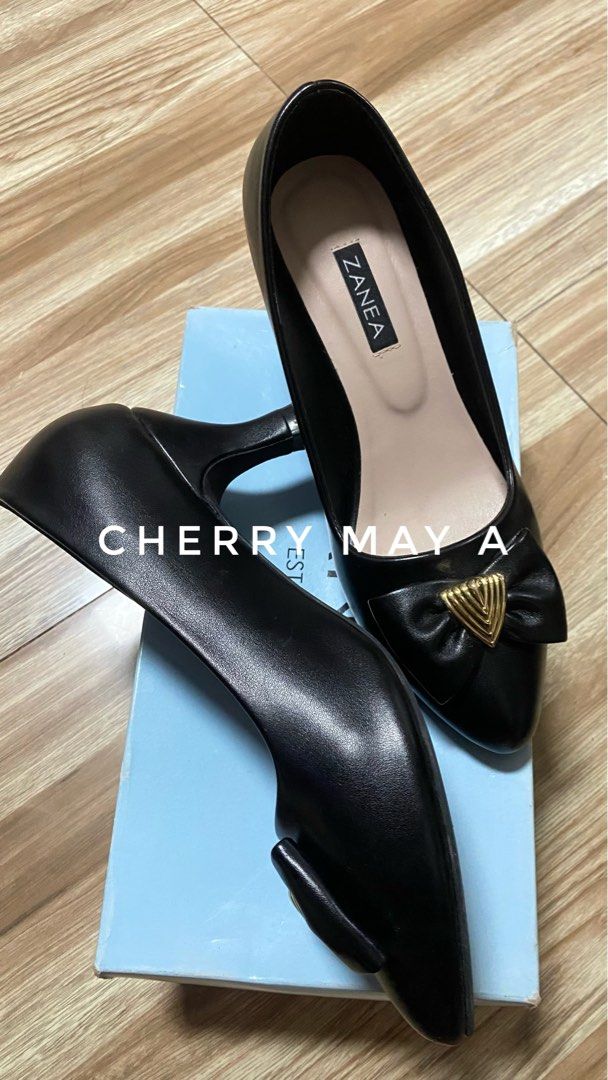 Zanea Black Leather Shoes (Matte) (Category: Heels) located in Paranaque City. Submitted by cherryblossoms1807 (Listing ID 1463978156, Image 2). Description: ✨Worn once during graduation last September 23 ✨With tiny flaw only. See last picture. Sumama yung leather pag alis ko nung heel pads na dinidikit. 🫠 But other than that, looks new. Bagong linis na din. ✨Bought ₱1699 at Robinson’s ✨Size10 ✨Free 2pcs new insole pads.
