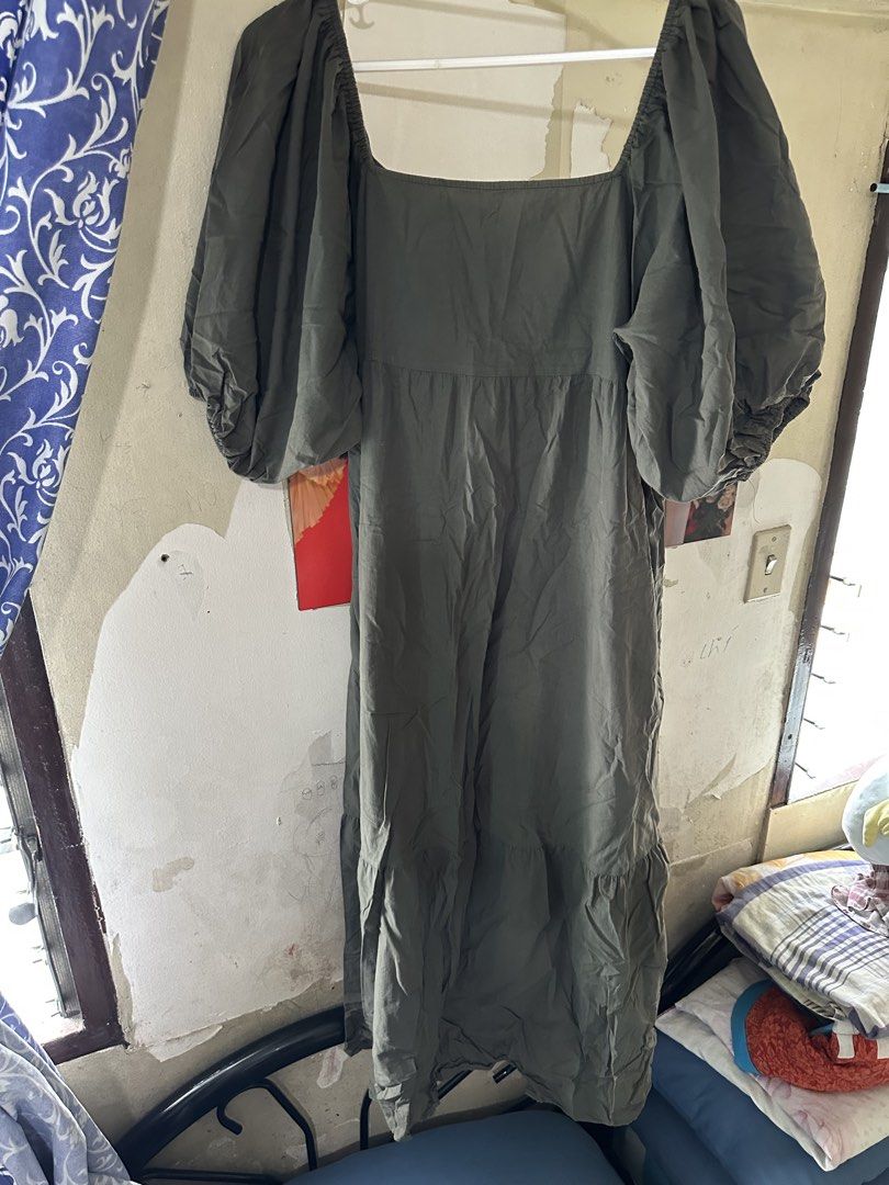 Zanzea puff dress XL (Category: Dresses) located in Pasay City. Submitted by kimverlygo50697 (Listing ID 1463940383, Image 2). Description: - Brand: Zanzea Collection - Color: Olive Green - Style: Maxi Dress - Neckline: Square Neck - Sleeves: Puff Sleeves - Hem: Tiered - Size: XL - Occasion: Casual wear or dressing up.