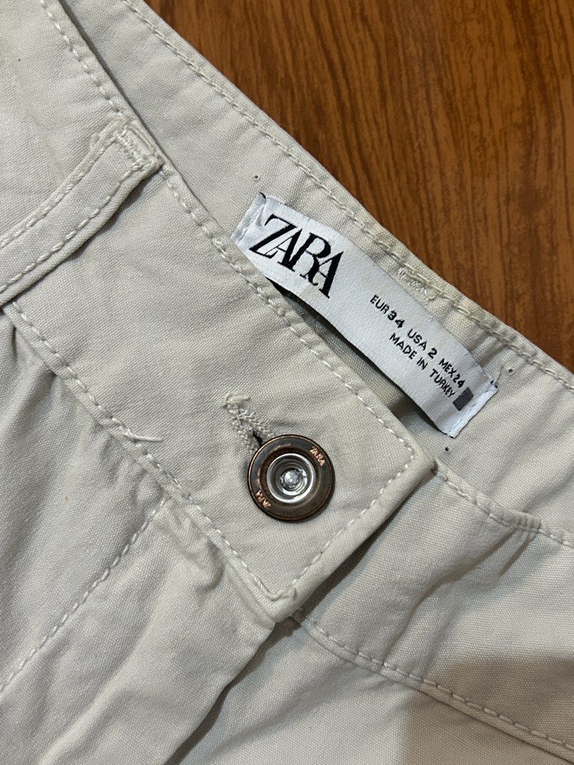 ZARA Beige Cargo Pants (Category: Jeans) located in Valenzuela. Submitted by everydaysale_deni (Listing ID 1463965227, Image 3). Description: - Cargo pants with front and back pockets -Adjustable drawstring hem - Size: EUR 34 / US 2 / MEX 24 - Ideal for: Casual wear.