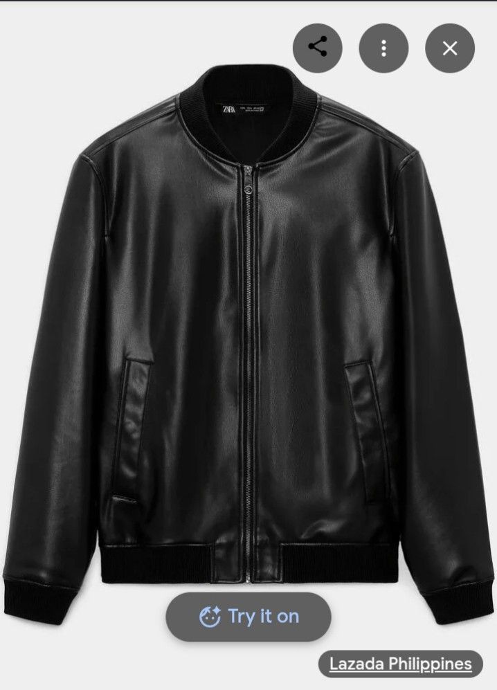 Zara Black Faux Leather Bomber Jacket (Category: Coats, Jackets and Outerwear) located in Manila. Submitted by chrisjeric90832 (Listing ID 1463973907, Image 1). Description: - Classic black leather jacket from Zara - Features ribbed collar, cuffs, and hem - Zip-up front closure - Two convenient side pockets - Sharp, stylish, and perfect for layering - 1 inside pocket - Original zara/ Prefer meet up so u can check the item - No bad smell/ 5mos old