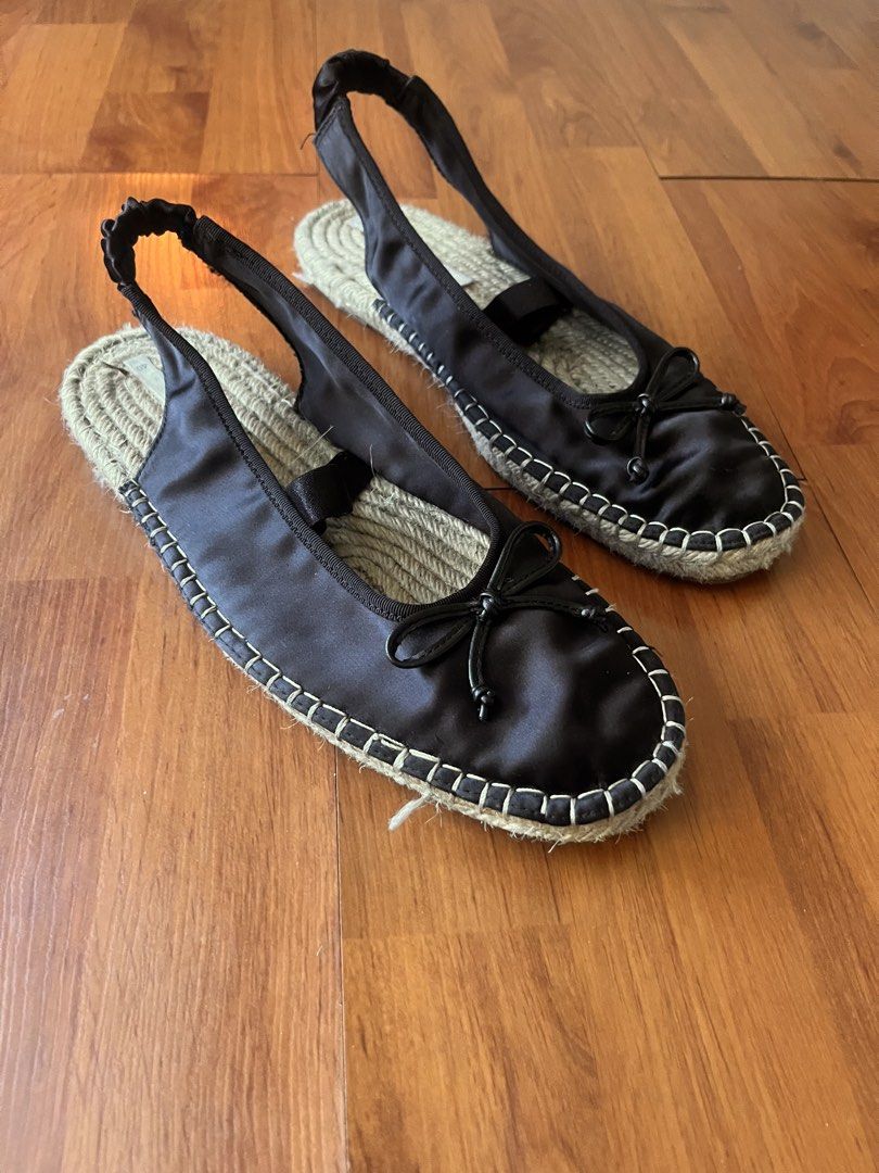 Zara Black Satin Slingback Espadrille Ballet Flat (Category: Flats & Sandals) located in Lipa City. Submitted by alexcollectionco (Listing ID 1464073545, Image 2). Description: Zara black satin slingback ballet flat espadrilles featuring a delicate bow tie on the toe cap, elasticated scrunchie heel strap, braided jute insoles, and contrast white topstitching around the welt. Size: EU 40 / US 9 Condition: Pre-owned condition. Satin uppers remain s