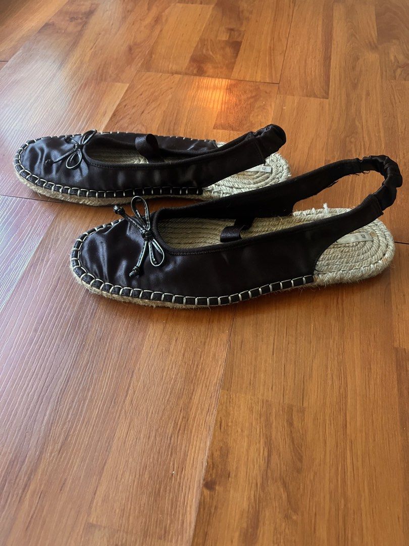 Zara Black Satin Slingback Espadrille Ballet Flat (Category: Flats & Sandals) located in Lipa City. Submitted by alexcollectionco (Listing ID 1464073545, Image 3). Description: Zara black satin slingback ballet flat espadrilles featuring a delicate bow tie on the toe cap, elasticated scrunchie heel strap, braided jute insoles, and contrast white topstitching around the welt. Size: EU 40 / US 9 Condition: Pre-owned condition. Satin uppers remain s