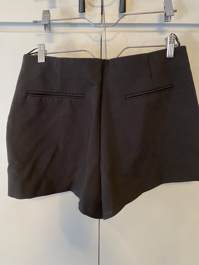 ZARA Black Skort XL fits L 29-31 (Category: Shorts) located in Quezon City. Submitted by doryscloset (Listing ID 1463941547, Image 2). Description: - Zara Black Skort - Size: XL (fits L-XL) - Made in Turkey - Features a side zip closure, no flaws - Two back pockets kept unopened - Skirt appearance with built-in shorts - Perfect for dressing up or down.