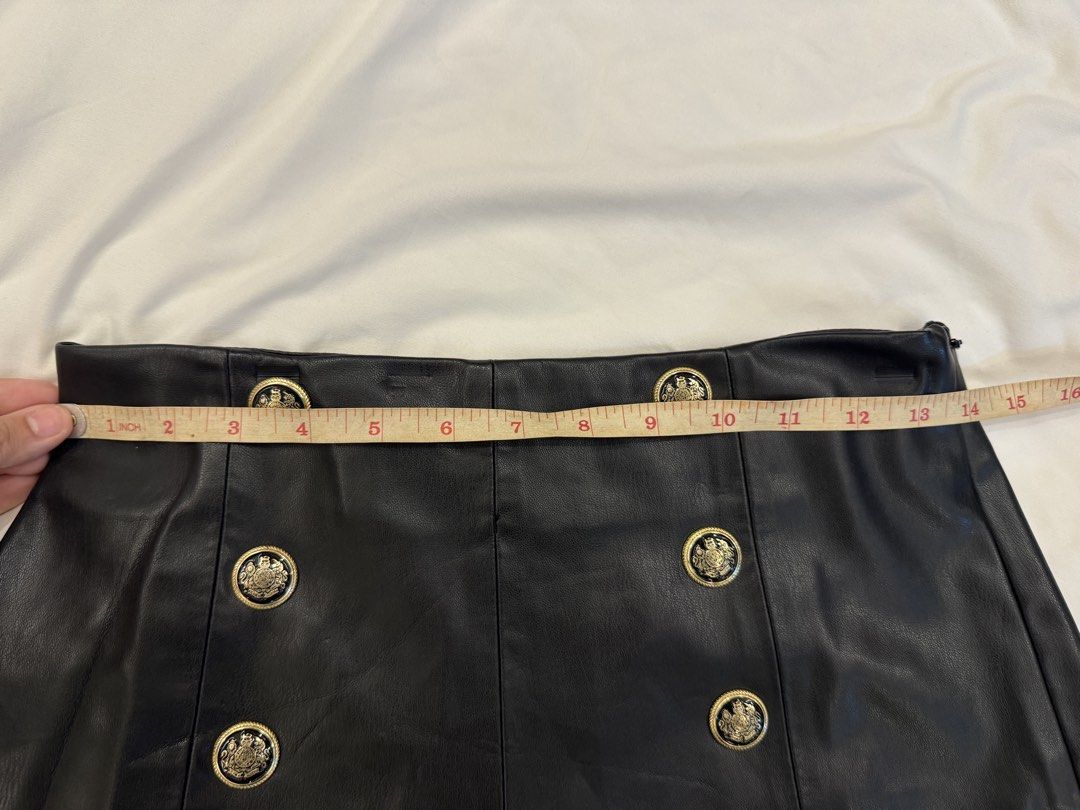 ZARA Leather Shorts (Category: Shorts) located in Quezon City. Submitted by declutteringmycloset__ (Listing ID 1463956153, Image 2). Description: - High-waisted style - Double button detail at the front - Used once.