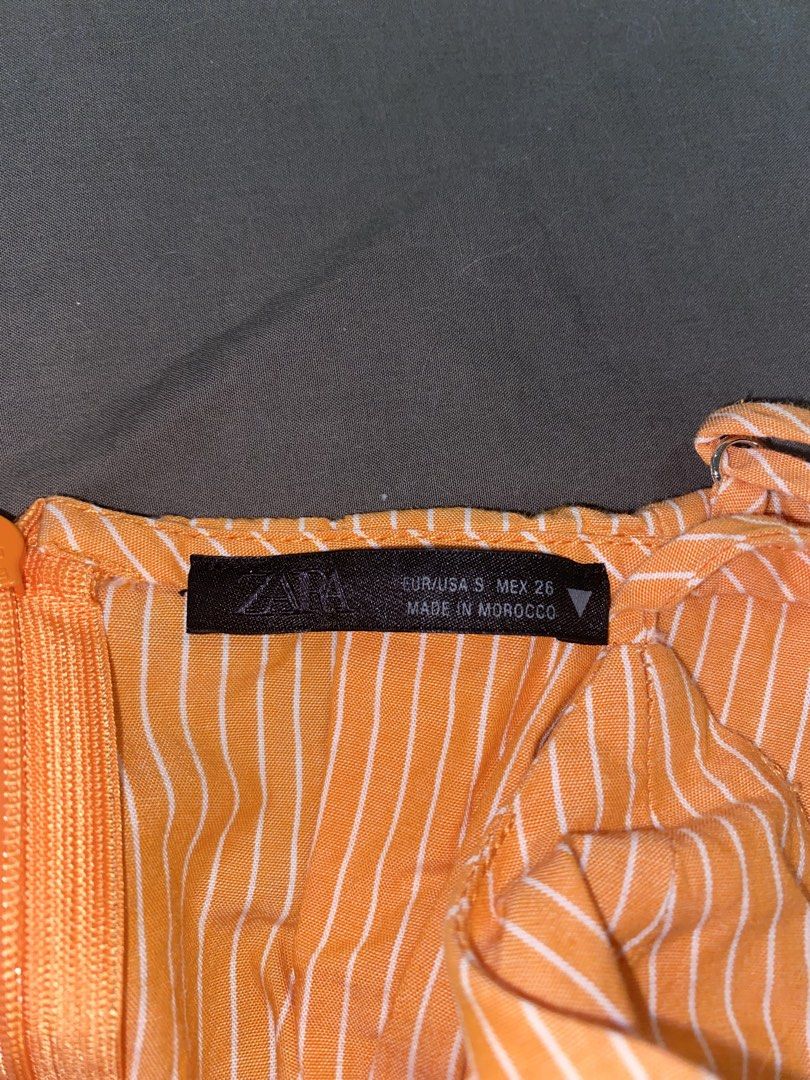 ZARA orange striped peplum top (Category: Sleeveless) located in Pasig City. Submitted by s0phiesells (Listing ID 1464022271, Image 2). Description: good as new! used only a few times but super cute:)) bought in zara japan .