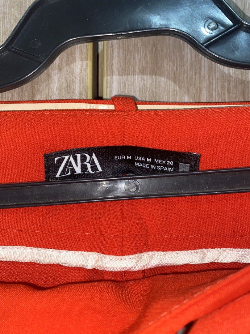 Zara Red Belted High-Waisted Trousers Size M (Category: Jeans) located in Manila. Submitted by braca21 (Listing ID 1464075921, Image 2). Description: - Zara Red Trousers - High-waisted fit - Matching belt included - Straight leg cut - Made in Spain - Size: Medium - Perfect for dressing up or down.