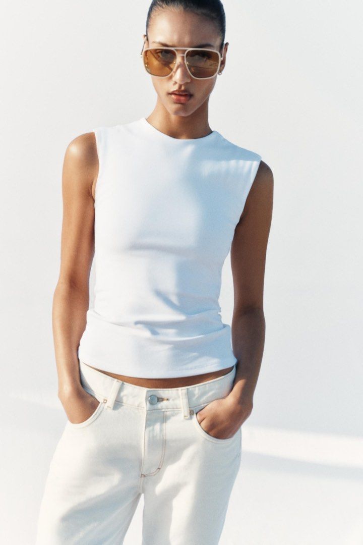 Zara Sleeveless Top White (Category: Sleeveless) located in Manila. Submitted by nothanamiii (Listing ID 1464004388, Image 2). Description: RULES All prices are final! No meetups No when worn No returns, No exchanges, No refund What you see is what you get. Happy Shopping MOP: GCASH / BPI Shipping: J&T.