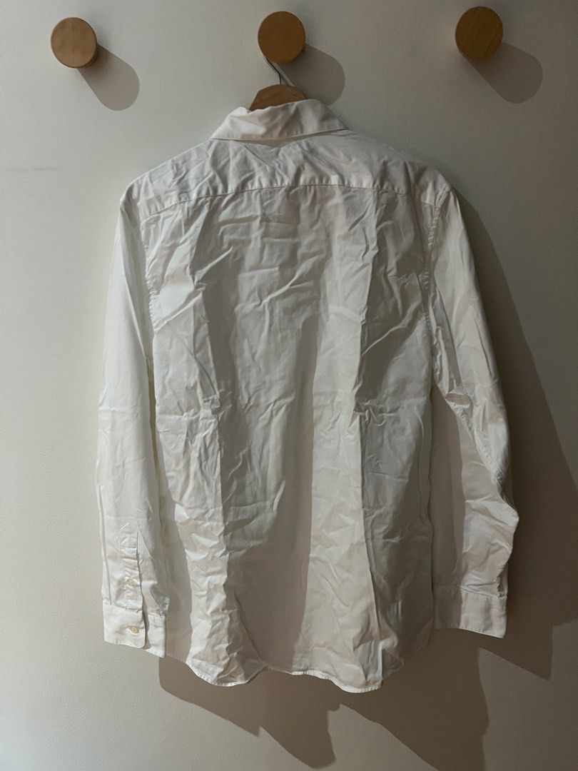 ZARA White Button up Polo shirt (Category: Formal Shirts) located in Pasig City. Submitted by tiny_studios (Listing ID 1464028813, Image 3). Description: - my brother’s white polo - used once for an event - regular fit chest 57cm length 75cm sleeves 70cm.