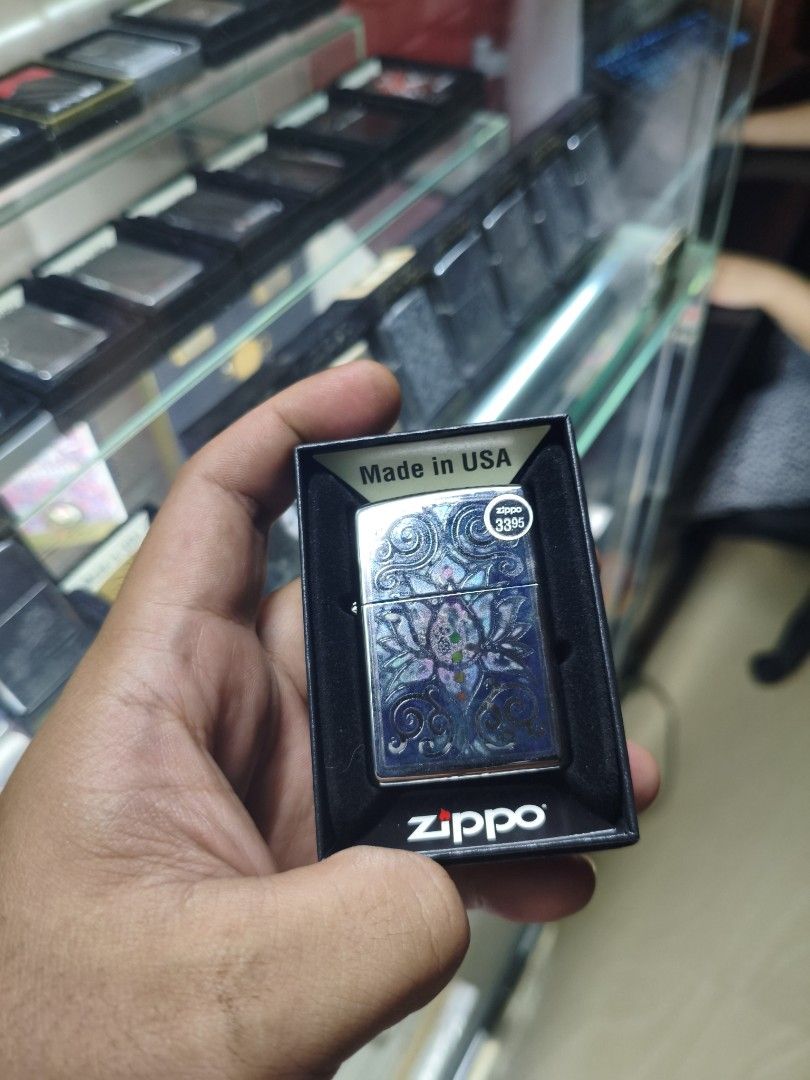 Zippo Lotus Flower Design (Category: Religious Items) located in Paranaque City. Submitted by Sensation (Listing ID 1464122435, Image 1). Description: Brand New Sealed .