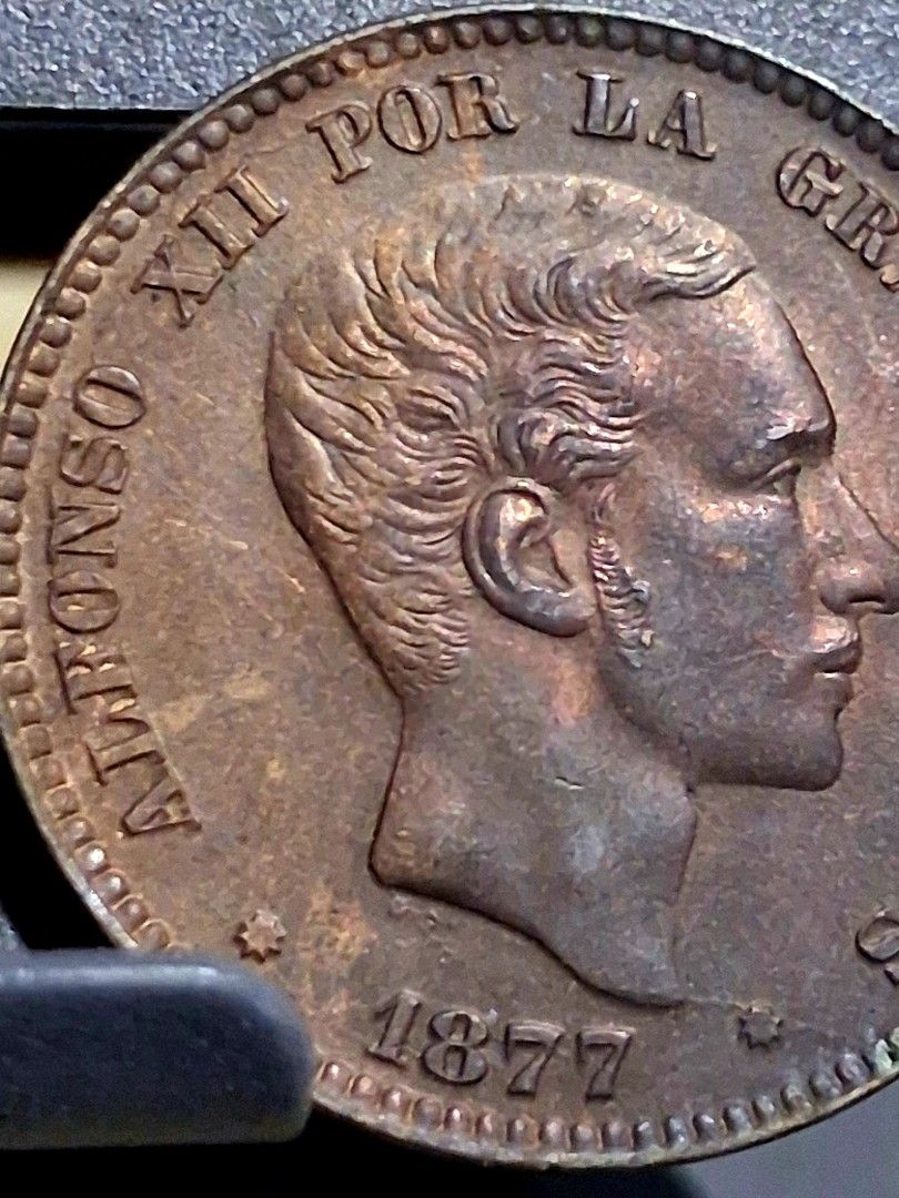1877 Alfonso Xii 10c Om With die crack error (Category: Currency) located in Quezon City. Submitted by lobaman (Listing ID 1464266642, Image 1). Description: 1877 alfonso xii 10c om. with brillo. diecrack error. very scarce in this condition. no auction record yet in any major house..