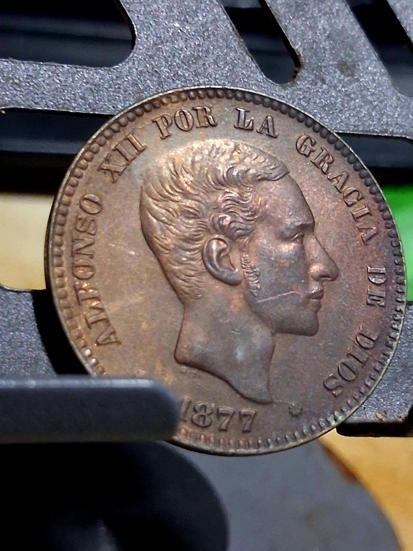 1877 Alfonso Xii 10c Om With die crack error (Category: Currency) located in Quezon City. Submitted by lobaman (Listing ID 1464266642, Image 3). Description: 1877 alfonso xii 10c om. with brillo. diecrack error. very scarce in this condition. no auction record yet in any major house..