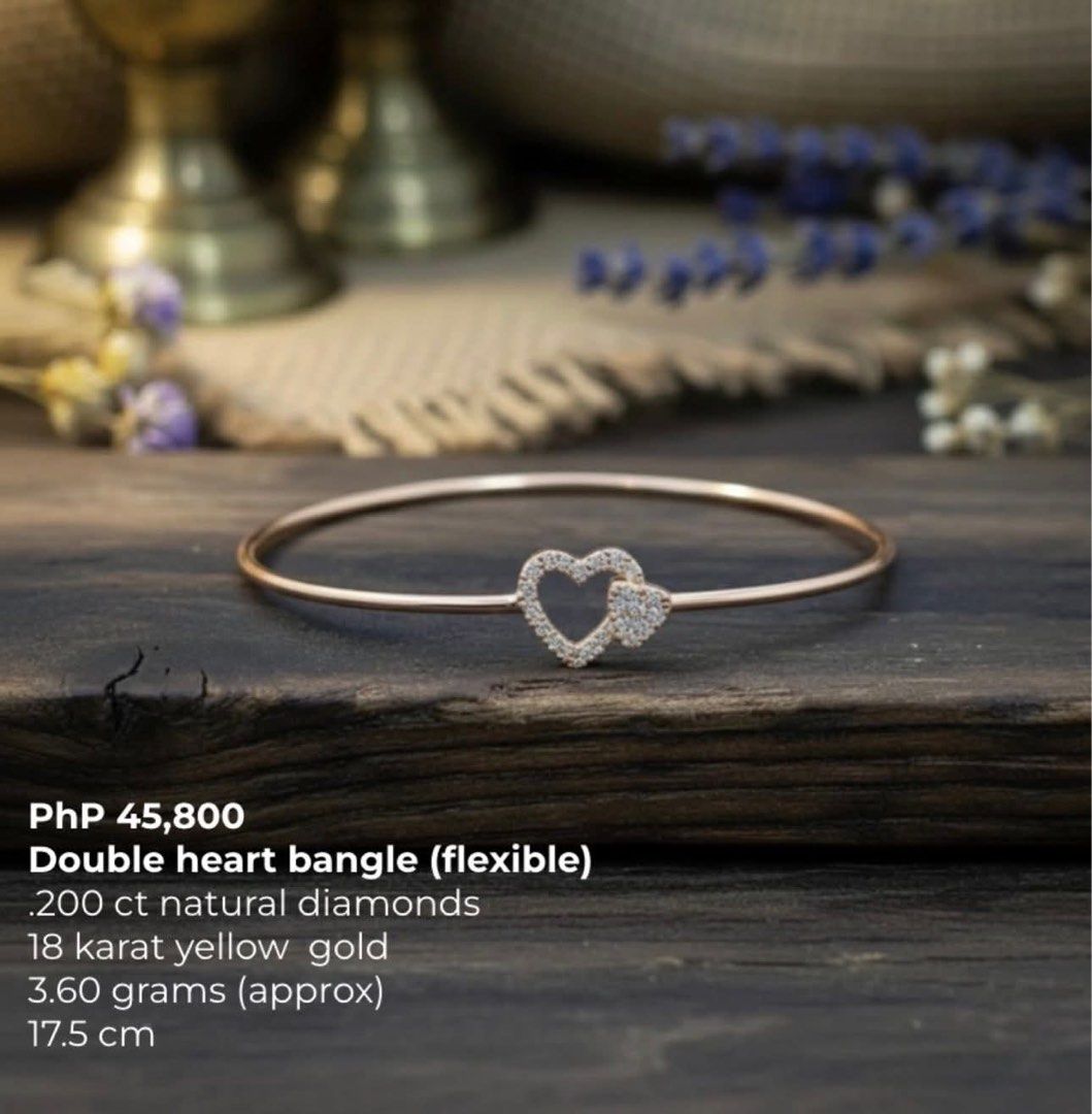 18K Yellow Gold Double Heart Diamond Bangle (Flexible) (Category: Bracelets) located in Quezon City. Submitted by lilyanddaisy (Listing ID 1464141057, Image 1). Description: - Flexible bangle with a chic double heart design. - Adorned with.200 ct of natural diamonds. - Crafted in lustrous 18 karat yellow gold. - Approximately 3.60 grams in weight. - Comfortable 17.5 cm length. - Ideal for both daily elegance and special events..
