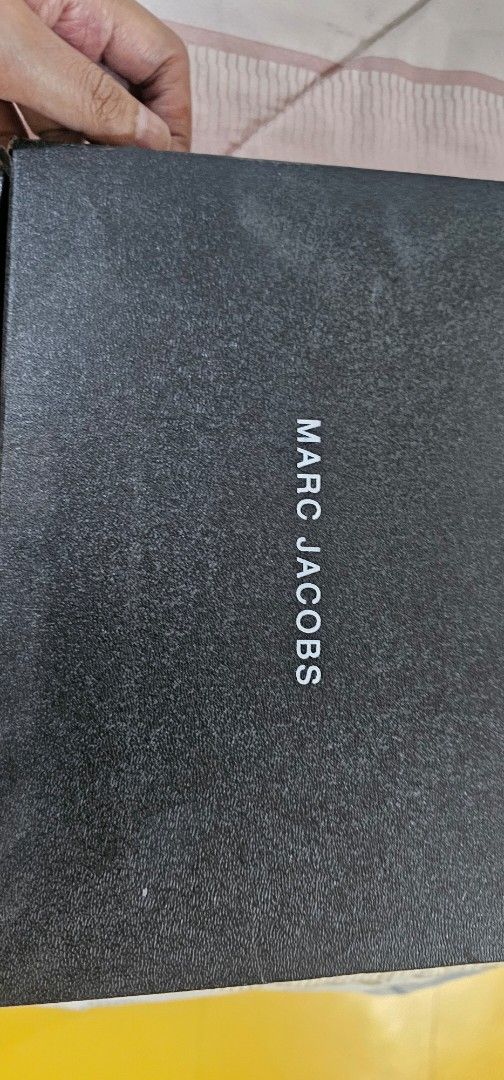 2 straps Marc Jacobs Snapshot Camera Bag Beige (Category: Luxury Bags & Wallets) located in Davao. Submitted by sachigo (Listing ID 1464195197, Image 2). Description: - Authentic Marc Jacobs camera bag - Color: Beige - Includes original box and dust bag - Adjustable strap with "The Marc Jacobs" branding - Gold hardware details - Ideal for everyday use bought outlet in china.