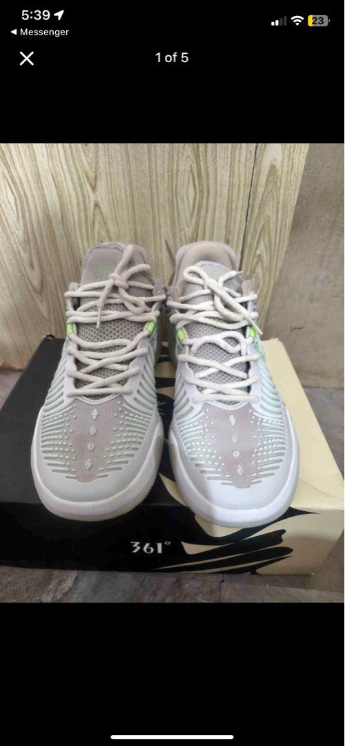 361 Joker 2 GT Miro (Category: Sneakers) located in Cebu City. Submitted by cla5clint39756 (Listing ID 1464238656, Image 2). Description: Grey and lime green basketball shoes. Laces are grey. The 361 Degrees logo is on the side. Comes with the original box. Great for playing basketball. Size 9.5 Used 3 times RFS. need for bills payment Negotiable for sure buyer.