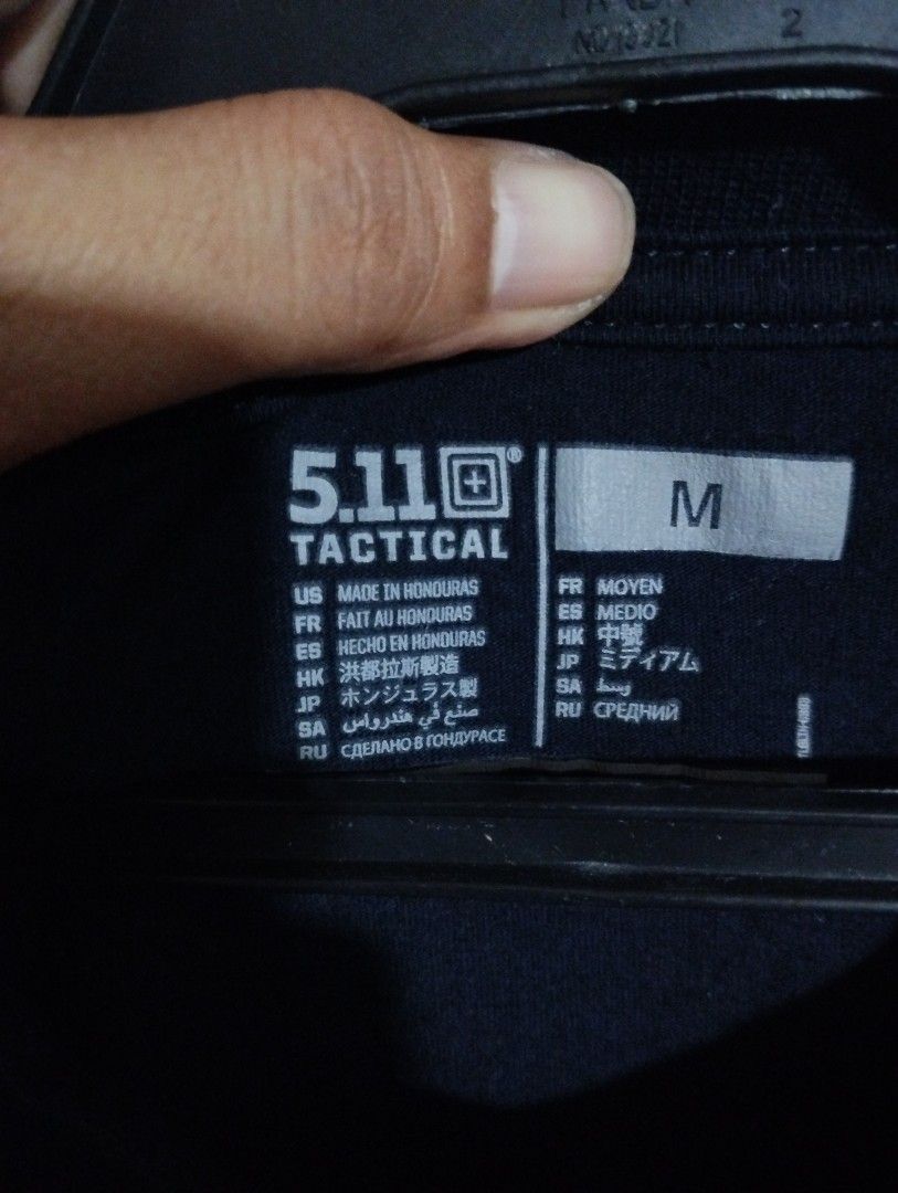 5.11 Tactical T-Shirt Size M (Category: Tshirts & Polo Shirts ) located in Candon. Submitted by bernabepradoiii (Listing ID 1464301556, Image 2). Description: - Brand: 5.11 Tactical - Color: Black - Size: Medium (M) - Origin: Made in Honduras - Features: Durable, suitable for everyday wear and tactical activities - Design: Simple and reliable.