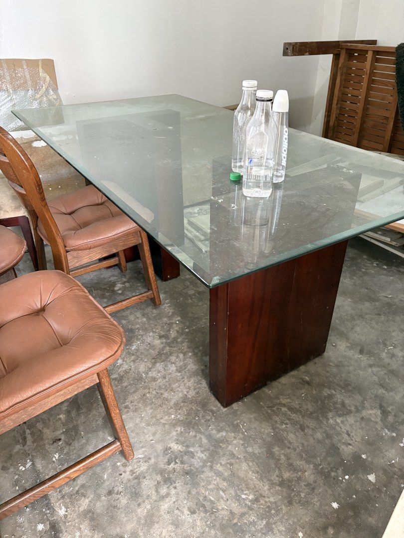 6-seater glass and wood table (Category: Tables & Sets) located in Manila. Submitted by vastfalcon.e9558f (Listing ID 1464184239, Image 2). Description: 6 seater glass top wooden base table, buyer to shoulder transport.