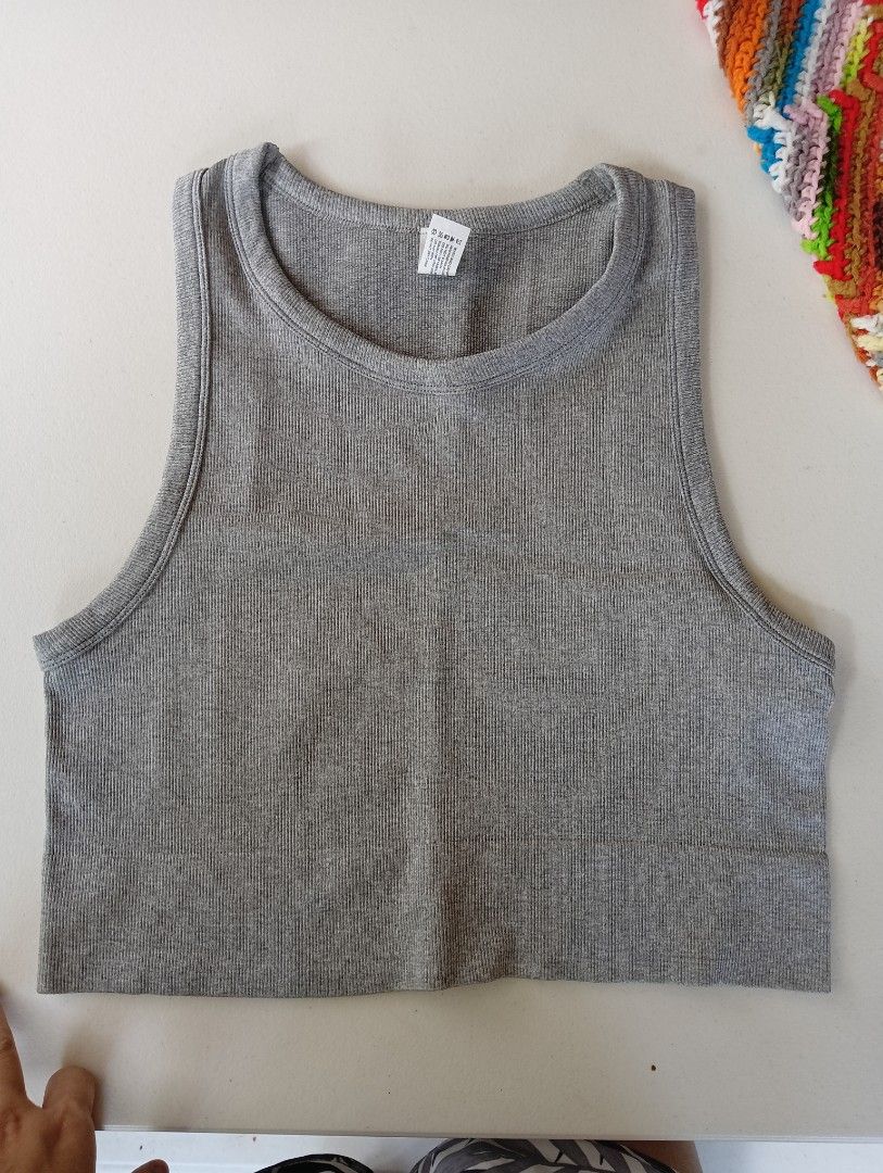 90 Degrees Tank Top by Reflex (Category: Activewear) located in Rizal. Submitted by timeless_shop (Listing ID 1464160752, Image 3). Description: 90 DEGREES BY REFLEX Seamless Cropped Tank - Gray ** Isang beses ko nasuot** 📏 XL on tag - Fits Medium- Large Bust Fit 34-36 🏷️ Details: - 45% Nylon / 49% Poly / 6% Spandex - Ribbed Knit - Stretchy, Soft, Presko ✨ Condition: 9.9/10 Like New - No flaws ito, maganda fabric at Malinis din. 🎨 Color rate 9