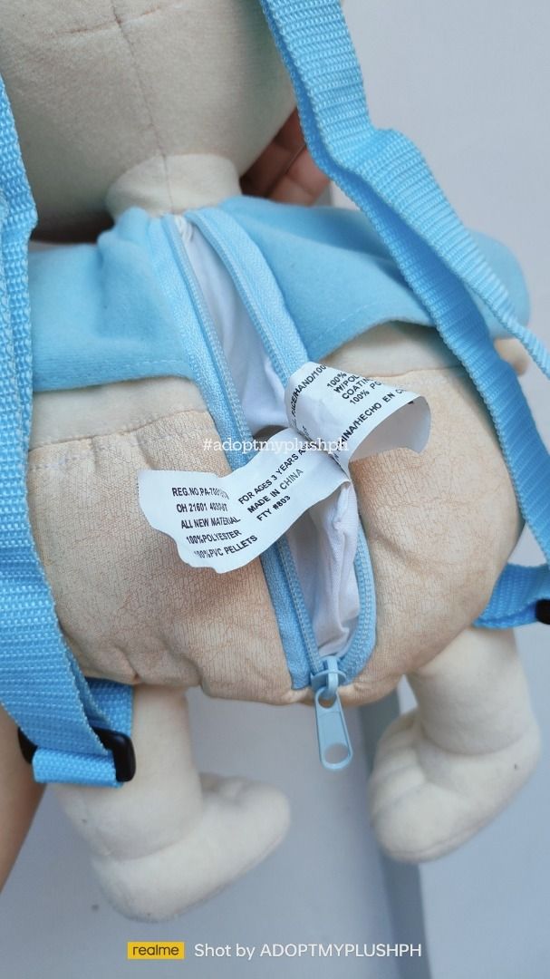 90s Rugrats, Tommy Pickles Plush Backpack (Category: Plushies & Soft Toys) located in Taguig. Submitted by adopt.my.plush.ph (Listing ID 1464303403, Image 2). Description: Tommy Pickles plush backpack features his classic light blue shirt and diaper with comfortable over-the-shoulder straps Character: Tommy Pickles, depicted in his classic light blue t-shirt and tan diaper. Type: Combination stuffed toy and functional novelty backpack, featuring 