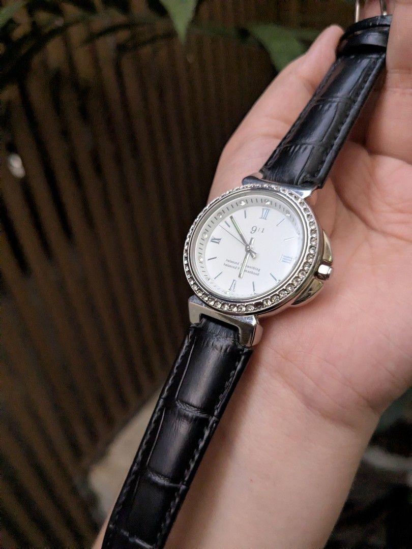 9l1 Japan Black Leather Strap Watch (Category: Women's Watches) located in Quezon City. Submitted by nnncorner (Listing ID 1464267668, Image 2). Description: Original 9l1 Japan Croc Black Leather Rhinestone Watch 9/10 condition 100% working condition has missing 3 rhinestone but doesn't affect the performance of the watch Still presentable With replacement box 20 peso coin size dial Fits 15-21cm wrist 100% authentic from Japan Genuine Italian Lea