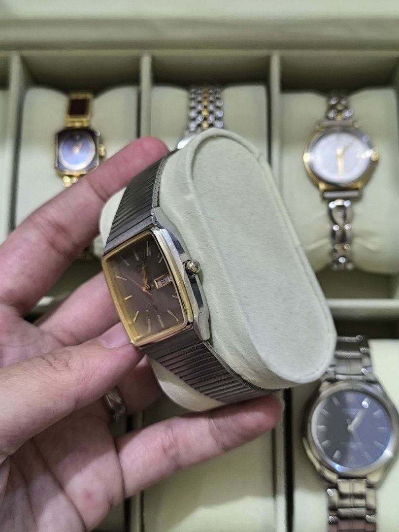 ⌚ CITIZEN CQ 3801-450329 TA — Vintage Rectangular Watch (Category: Men's Watches) located in Pasig City. Submitted by thevintagechroniclefindsph (Listing ID 1464185666, Image 2). Description: Classic vintage Citizen CQ with a distinctive rectangular/rounded-square case, champagne/taupe dial, gold-tone accents, date display, and integrated stainless-steel-style bracelet. A very clean 1970s/1980s Japanese quartz-era design that's easy to dress up o