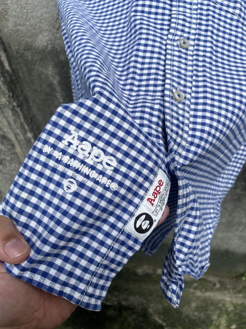 AAPE BY A BATHING APE Gingham Button Up Shirt (Category: Tshirts & Polo Shirts ) located in Makati City. Submitted by christian_g (Listing ID 1464248586, Image 3). Description: Aape Polo Longsleeves •Size: Medium (28L 21W) •Excellent condition •No issue .