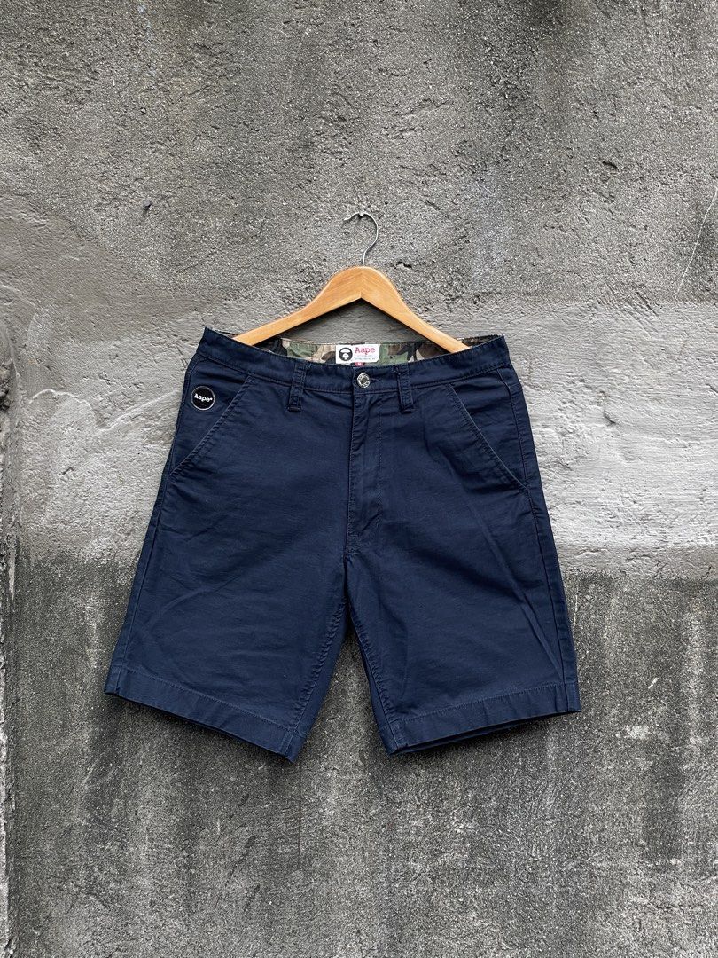 AAPE BY A BATHING APE Navy Cargo Shorts (Category: Shorts) located in Makati City. Submitted by christian_g (Listing ID 1464248766, Image 1). Description: Aape Backprint Shorts •Size: 32-34 waist •Length: 20 •Leg Hole: 11 •Excellent Condition •No issue .