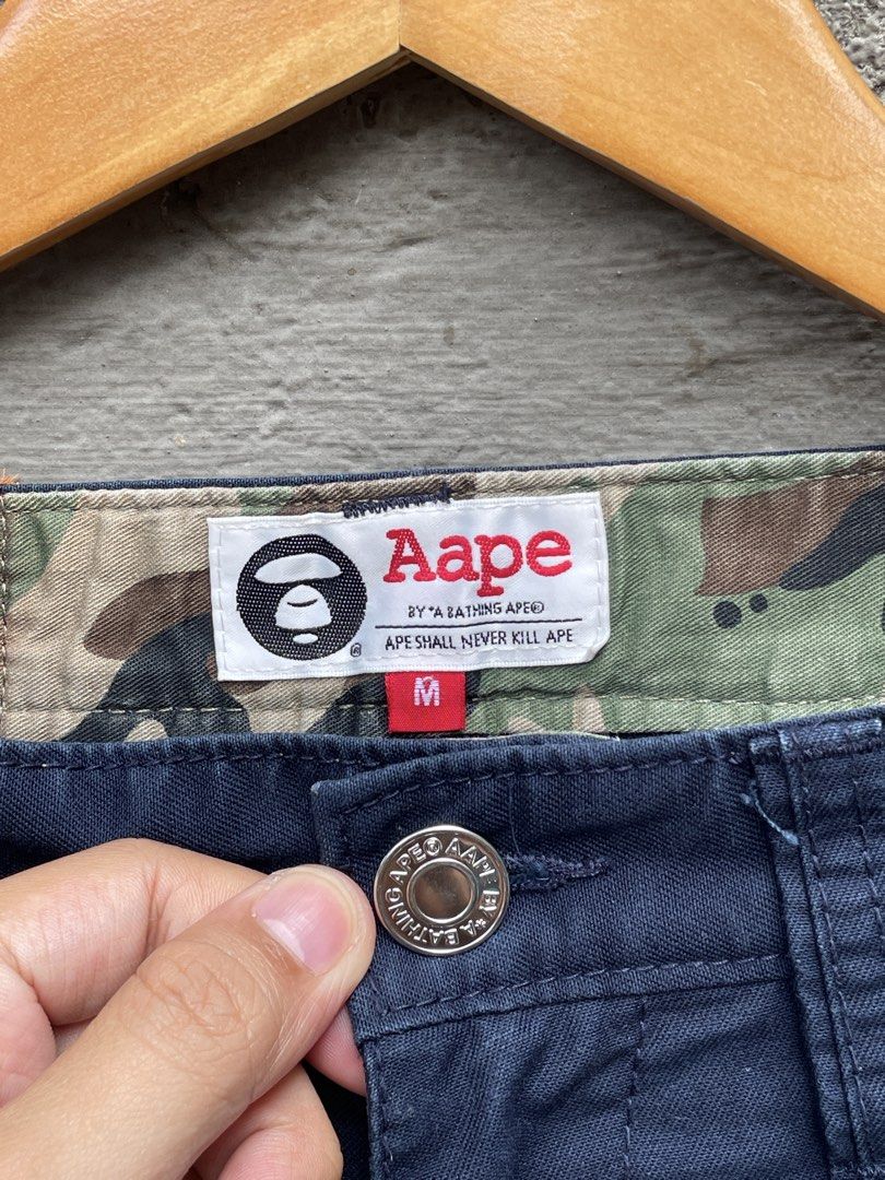 AAPE BY A BATHING APE Navy Cargo Shorts (Category: Shorts) located in Makati City. Submitted by christian_g (Listing ID 1464248766, Image 3). Description: Aape Backprint Shorts •Size: 32-34 waist •Length: 20 •Leg Hole: 11 •Excellent Condition •No issue .