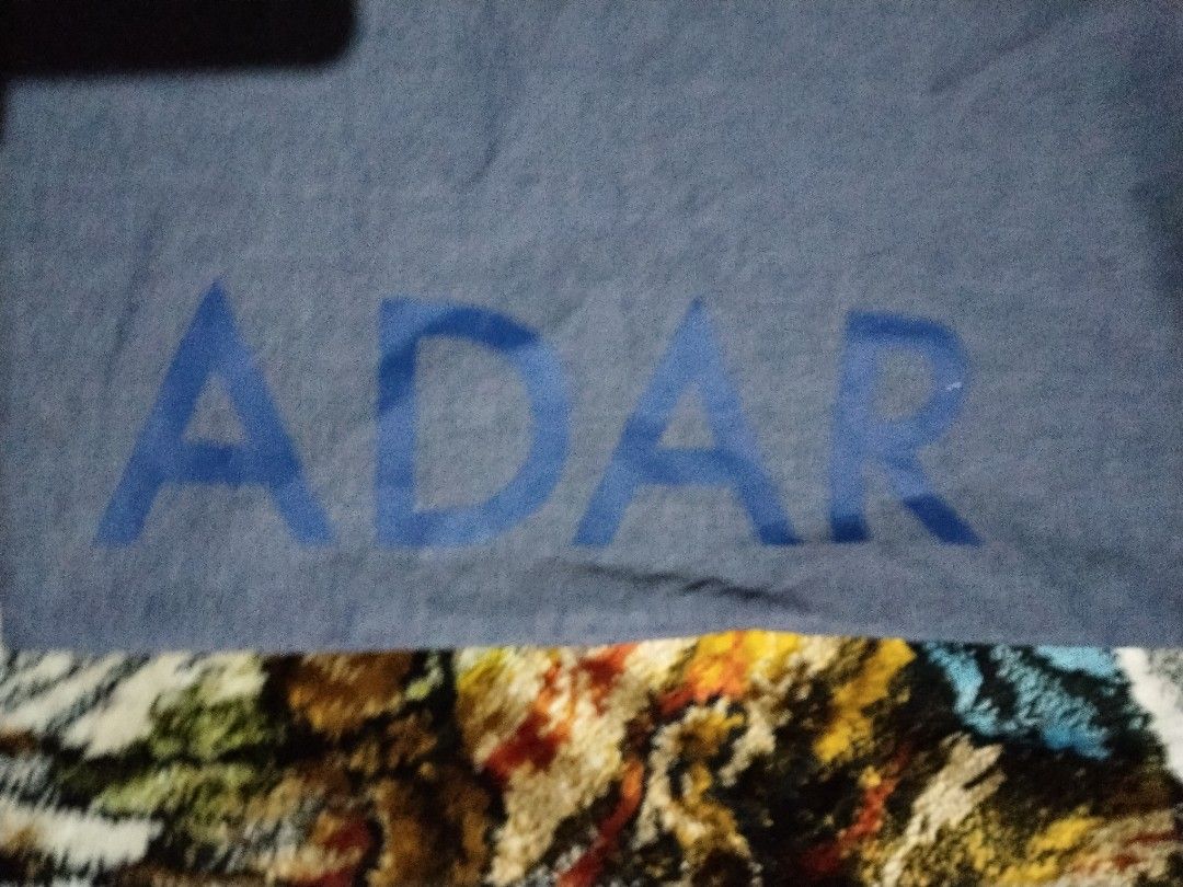 Adar Tote Bag (Category: Tote Bags) located in Mabalacat. Submitted by al_amin_thrift (Listing ID 1464229435, Image 2). Description: 🛍️ ADAR Chambray Tote Bag — Slate Blue Item Details - Brand: ADAR — known for professional & lifestyle apparel ​ - Style: Everyday shoulder tote ​ - Material: Lightweight, soft-woven chambray cotton — breathable & durable ​ - Color: Muted slate blue / heathered denim tone with bright blue "ADAR" lettering ​ - Featu