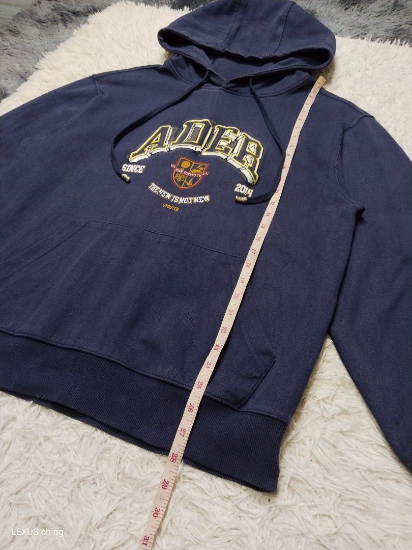 ADER error navy collegiate style hoodie embroidered ADER (Category: Hoodies) located in Manila. Submitted by lexusthrift1995 (Listing ID 1464185204, Image 3). Description: Size- A1 on tag but fit to LARGE to XL Dimension- 22x28 Color rate- 8/10 Condition- 9/10 good condition ‼️350.pesos plus shipping fee 💸MODE OF PAYMENT- GCASH payment first 🚛MODE OF DELIVERY- J&T or LALAMOVE 📍LOCATION- NORTH CALOOCAN CAMARIN BRGY.177 1705 SUNFLOWER STREET. 🗒