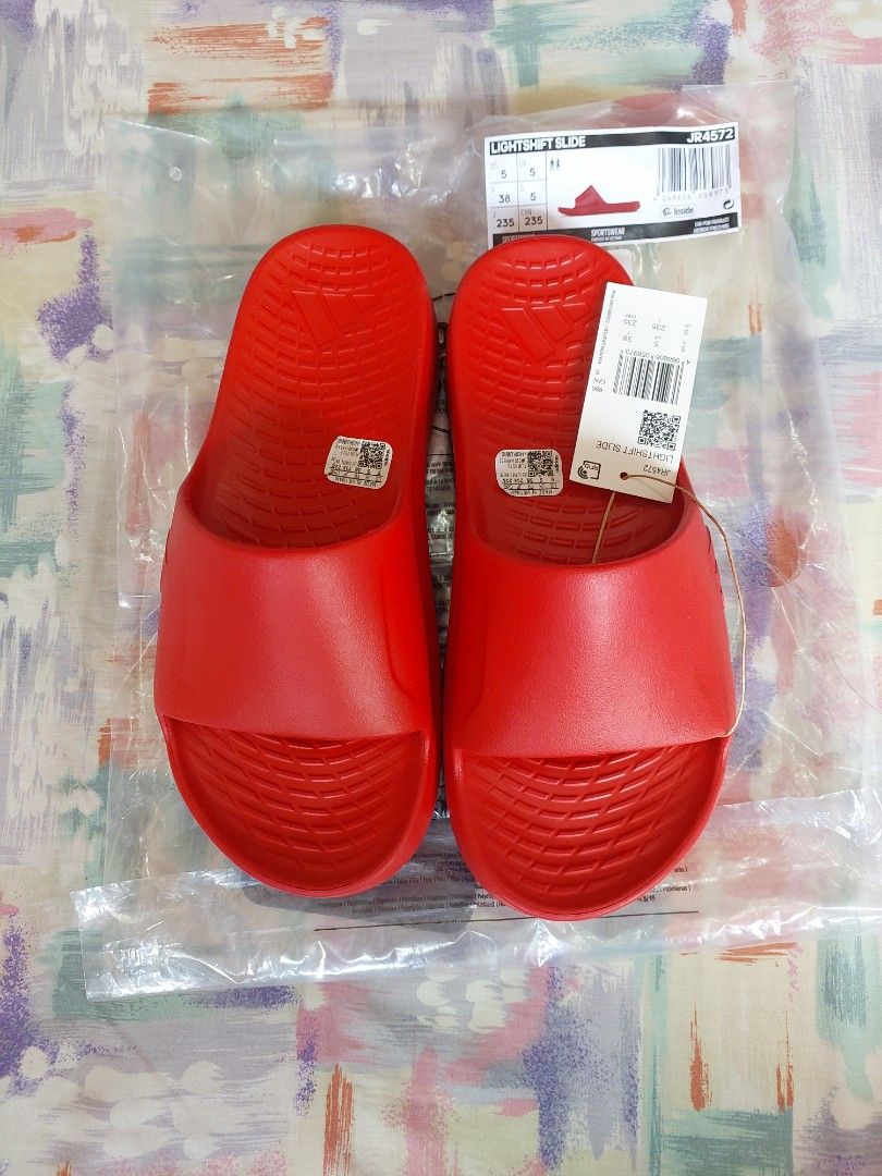 Adidas Lightshift Slide Red Size UK 5 (Category: Slippers & Slides) located in Cebu City. Submitted by choithrift0326 (Listing ID 1464163904, Image 2). Description: - Red Adidas Slides (Model JR4572) - Size: 38 EU / 5 UK / 5 US / 235mm - Original Price: PHP 1,500.00 - Made in Vietnam - Ideal for casual wear or post-sports relaxation.