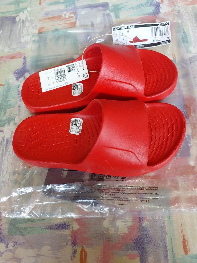 Adidas Lightshift Slide Red Size UK 5 (Category: Slippers & Slides) located in Cebu City. Submitted by choithrift0326 (Listing ID 1464163904, Image 3). Description: - Red Adidas Slides (Model JR4572) - Size: 38 EU / 5 UK / 5 US / 235mm - Original Price: PHP 1,500.00 - Made in Vietnam - Ideal for casual wear or post-sports relaxation.