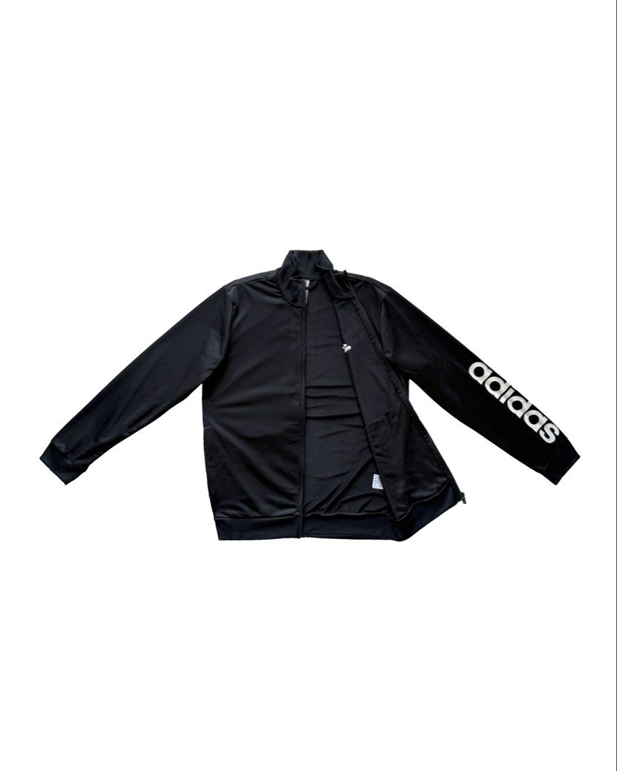 Adidas Basic Black Jacket (Category: Coats, Jackets and Outerwear) located in Manila. Submitted by morf_sply (Listing ID 1464224986, Image 2). Description: Regular fit cotton jacket with welt hip pockets. Made of lightweight cotton fabric. Long sleeves with bold brand logo on the left. Zip-up front. XL on tag. Best fit L. Shoulder Width 17 in Pit to Pit 22 in Length 27 in Sleeves 26 in.