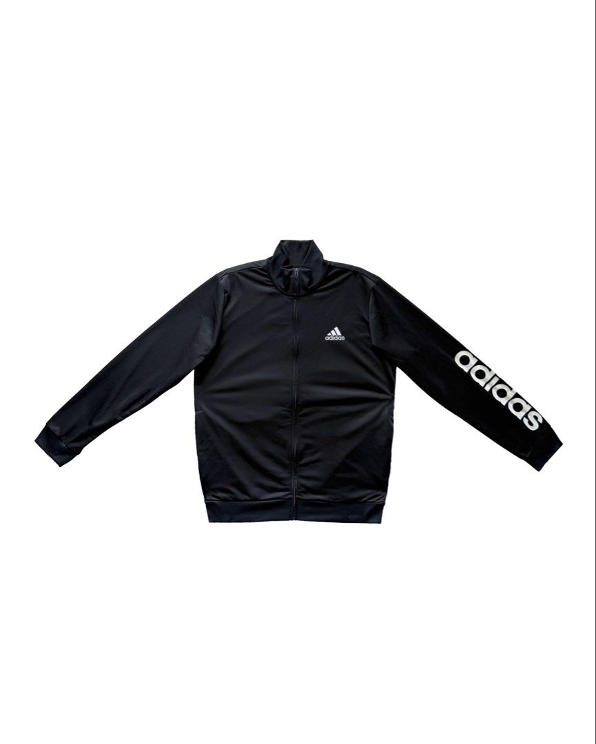 Adidas Basic Black Jacket (Category: Coats, Jackets and Outerwear) located in Manila. Submitted by morf_sply (Listing ID 1464224986, Image 1). Description: Regular fit cotton jacket with welt hip pockets. Made of lightweight cotton fabric. Long sleeves with bold brand logo on the left. Zip-up front. XL on tag. Best fit L. Shoulder Width 17 in Pit to Pit 22 in Length 27 in Sleeves 26 in.