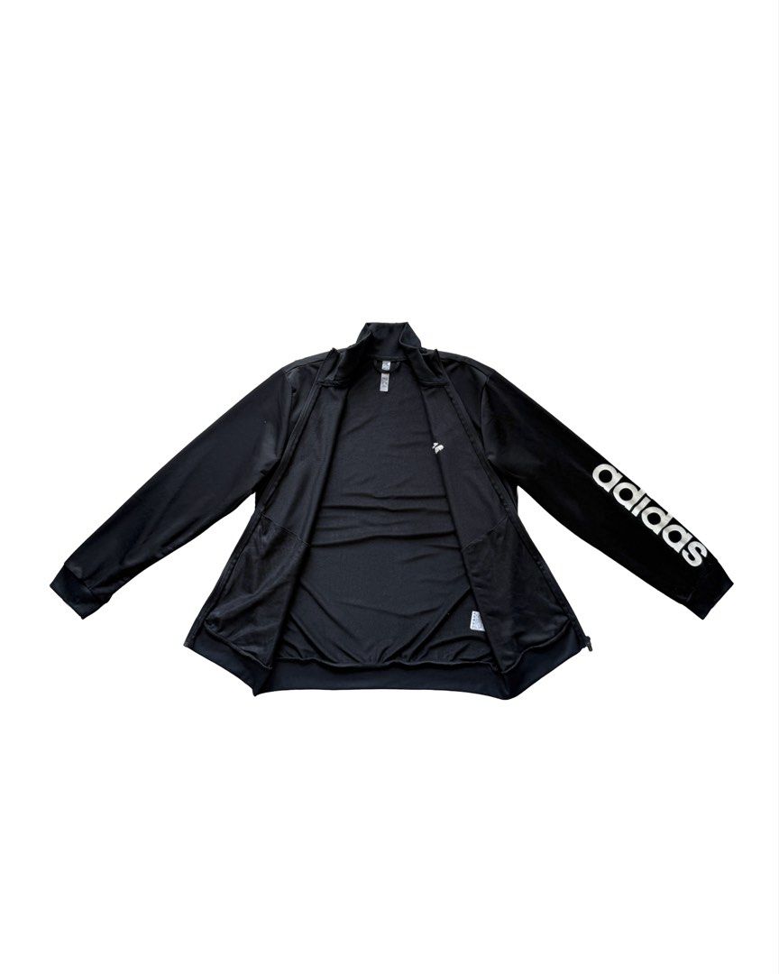Adidas Basic Black Jacket (Category: Coats, Jackets and Outerwear) located in Manila. Submitted by morf_sply (Listing ID 1464224986, Image 3). Description: Regular fit cotton jacket with welt hip pockets. Made of lightweight cotton fabric. Long sleeves with bold brand logo on the left. Zip-up front. XL on tag. Best fit L. Shoulder Width 17 in Pit to Pit 22 in Length 27 in Sleeves 26 in.