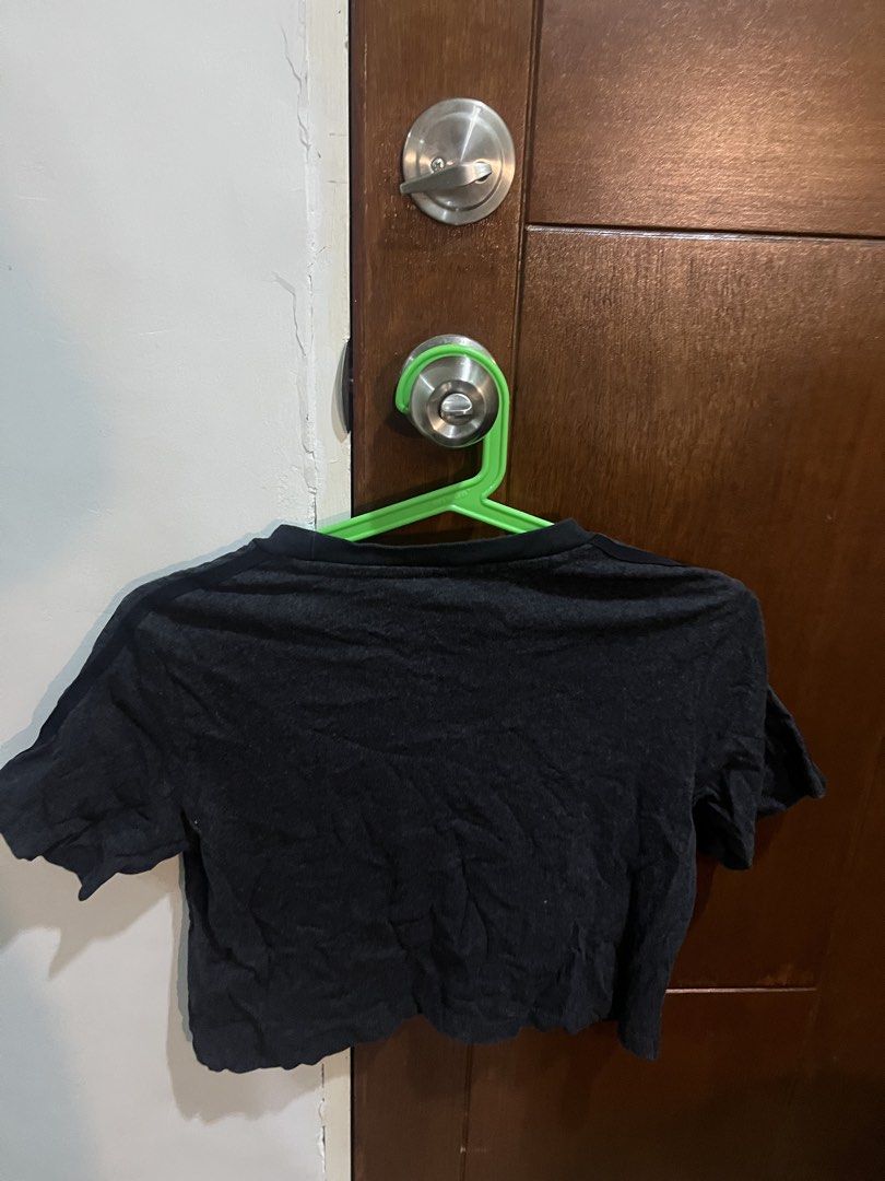 Adidas Black Cropped T-shirt (Category: Shirts) located in Pasig City. Submitted by kakerts (Listing ID 1464290070, Image 2). Description: - Black Adidas cropped t-shirt - Features classic trefoil logo on chest - Short sleeves - Relaxed fit - Made in Pakistan - Ideal for casual wear.