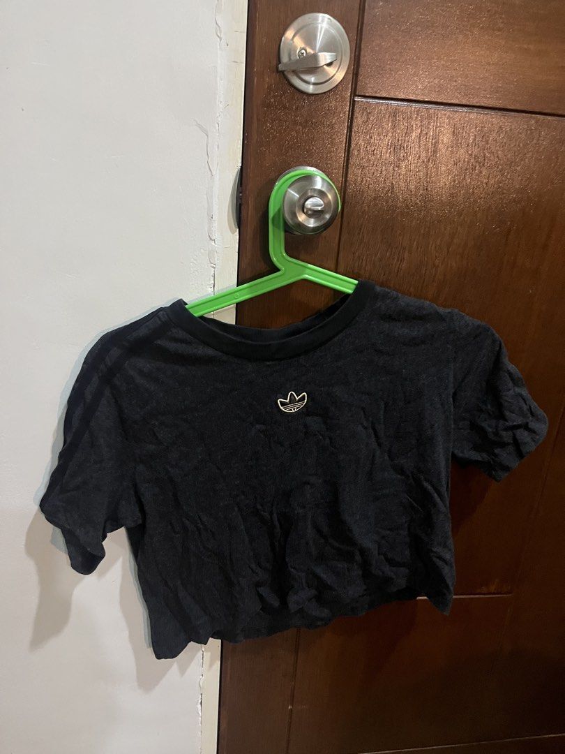 Adidas Black Cropped T-shirt (Category: Shirts) located in Pasig City. Submitted by kakerts (Listing ID 1464290070, Image 1). Description: - Black Adidas cropped t-shirt - Features classic trefoil logo on chest - Short sleeves - Relaxed fit - Made in Pakistan - Ideal for casual wear.