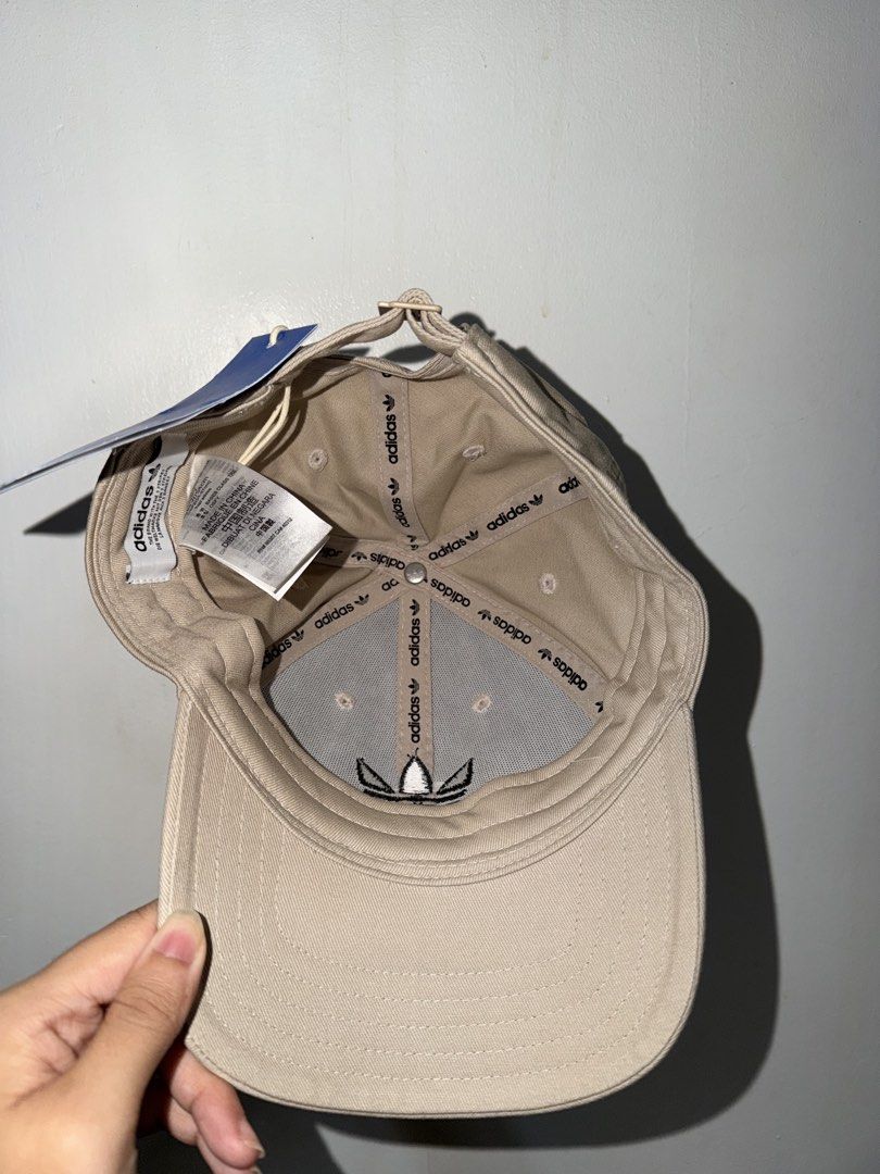Adidas Cap Beige with Black Logo (Category: Caps & Hats) located in San Pedro. Submitted by b_shoppu (Listing ID 1464176442, Image 3). Description: - Classic Adidas cap - Neutral beige color - Iconic black trefoil logo embroidered on front - Adjustable strap for a comfortable fit - Great for everyday wear - Simple and stylish.